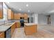 Spacious kitchen featuring an island, stainless steel appliances, and ample cabinet space at 3705 Rivermist Dr, Raleigh, NC 27610