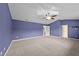 Large main bedroom with vaulted ceilings, plush carpet, and plenty of natural light at 3705 Rivermist Dr, Raleigh, NC 27610