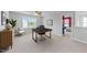 Stylish office space with a modern desk and a large window at 3705 Rivermist Dr, Raleigh, NC 27610