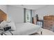 Comfortable bedroom featuring wood dresser, bedside tables, and a bright window view at 3803 Jonesville Rd, Wake Forest, NC 27587