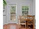 Bright dining area with natural light and access to the outdoor deck at 3803 Jonesville Rd, Wake Forest, NC 27587