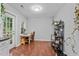 Bright dining area with natural light and access to the outdoor deck at 3803 Jonesville Rd, Wake Forest, NC 27587