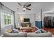 Inviting living room featuring a ceiling fan and an open-concept layout at 3803 Jonesville Rd, Wake Forest, NC 27587