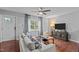 Cozy living room with a large window and comfortable seating arrangement at 3803 Jonesville Rd, Wake Forest, NC 27587