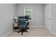 Office with computer, chair, neutral walls, and a bright window at 3803 Jonesville Rd, Wake Forest, NC 27587