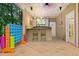Entertain friends in the game room featuring playful connect four, bar, and tile floors at 4021 Chaumont Dr, Apex, NC 27539