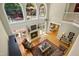 Elegant living room boasts soaring ceilings, fireplace, hardwood floors, and abundant natural light at 4021 Chaumont Dr, Apex, NC 27539