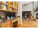 Comfortable home office with built-in desk space, shelving, and open access to the living area at 4021 Chaumont Dr, Apex, NC 27539