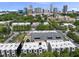 An aerial view showcases the property's proximity to downtown, with lush greenery and modern architectural details at 414 Chavis Way, Raleigh, NC 27601