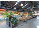 Transfer Co. Food Hall with different food vendors and communal seating at 414 Chavis Way, Raleigh, NC 27601