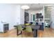 Open dining and kitchen area showcasing modern cabinetry and stainless steel appliances at 414 Chavis Way, Raleigh, NC 27601