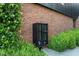 Mailboxes are surrounded by greenery, adding charm and convenience to the complex's communal features at 414 Chavis Way, Raleigh, NC 27601