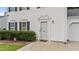 Close-up of the front entrance showcasing the well-maintained siding and manicured landscaping at 4221 Ivy Hill Rd, Raleigh, NC 27616