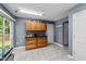 Spacious kitchen featuring wood cabinetry, black countertops and tiled flooring at 4221 Ivy Hill Rd, Raleigh, NC 27616