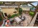 Picturesque backyard patio featuring a pergola, comfortable lounge area, and lush landscaping at 4409 All Points View Way, Raleigh, NC 27614