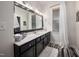 Bright bathroom with a large mirror, spacious counter, and modern fixtures at 4409 All Points View Way, Raleigh, NC 27614
