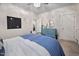 Bright bedroom featuring a ceiling fan, a blue dresser, and plenty of natural light at 4409 All Points View Way, Raleigh, NC 27614