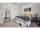 Cozy bedroom with a comfortable bed, decorative pillows, and a ceiling fan at 4409 All Points View Way, Raleigh, NC 27614