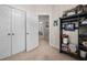 An airy bedroom with a spacious closet, and a view into the main bedroom at 4409 All Points View Way, Raleigh, NC 27614