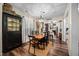 Inviting dining room with hardwood floors and a view into the kitchen at 4409 All Points View Way, Raleigh, NC 27614