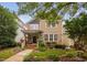 Charming two-story home featuring a welcoming front porch and beautifully landscaped front yard at 4409 All Points View Way, Raleigh, NC 27614