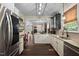 Modern kitchen with stainless steel appliances and granite countertops at 4409 All Points View Way, Raleigh, NC 27614