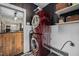 Convenient laundry room featuring a stacked washer and dryer and open shelving at 4409 All Points View Way, Raleigh, NC 27614
