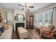 Cozy living room featuring a fireplace and hardwood floors, perfect for relaxation at 4409 All Points View Way, Raleigh, NC 27614