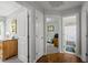 Hallway with wood floors and views to bedroom and bathroom at 4508 Alice Dr, Oxford, NC 27565
