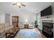 Relaxing living room with a fireplace, vaulted ceiling, and comfortable seating at 4508 Alice Dr, Oxford, NC 27565