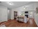 Cozy living room featuring wood floors, a fireplace, and neutral wall colors at 4508 Alice Dr, Oxford, NC 27565