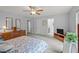 This is a spacious main bedroom showcasing an open layout, a ceiling fan, and natural light at 4508 Alice Dr, Oxford, NC 27565
