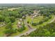 An aerial view of a neighborhood surrounded by lush greenery and manicured lawns at 50 Consella Way, Franklinton, NC 27525