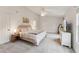 Spacious primary bedroom with a ceiling fan, neutral carpet and natural light at 50 Consella Way, Franklinton, NC 27525