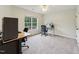 Spacious office with lots of light, two desks, and gray carpet at 50 Consella Way, Franklinton, NC 27525