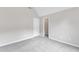 Cozy bedroom with fresh carpet, large window and access to a walk-in closet at 5025 Stonewood Pines Dr, Knightdale, NC 27545