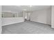 Bright upstairs living space with carpeting and natural light at 5025 Stonewood Pines Dr, Knightdale, NC 27545