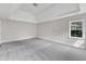 Bright main bedroom with carpeting and natural light at 5025 Stonewood Pines Dr, Knightdale, NC 27545