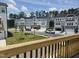 View from balcony of new homes and well-manicured lawns in a beautiful residential community at 5029 Jowetts Walk Dr # 29, Cary, NC 27519