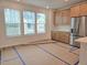 Bright kitchen with stainless steel appliances, ample cabinetry, and natural light at 5029 Jowetts Walk Dr # 29, Cary, NC 27519