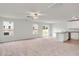 Bright and airy living room with carpet, white walls, recessed lighting, and sliding glass door at 51 Crow Field St, Roxboro, NC 27574