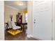 Welcoming entryway with hardwood floors and a view into a bright office space, creating an inviting first impression at 522 Finnbar Dr, Cary, NC 27519