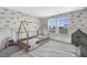 Cozy bedroom with themed wallpaper, a unique canopy bed, and a window showcasing the neighborhood at 604 Salmonberry Dr, Holly Springs, NC 27540