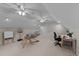 Large and functional bonus room with desk, ceiling fans, and play area at 6717 Ebon Ct, Raleigh, NC 27615
