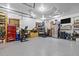 Spacious garage with epoxy flooring and ample storage, offering both functionality and style at 676 Whitehurst, Pittsboro, NC 27312