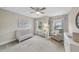 Bedroom featuring neutral walls, white carpet, and natural light for a comforting and inviting space at 707 Newlyn Dr, Raleigh, NC 27606