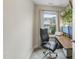 Home office space featuring a large window, desk, dual monitors, and comfortable black chair at 707 Newlyn Dr, Raleigh, NC 27606