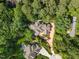 Aerial view of a beautiful home surrounded by lush greenery and a private setting at 71012 Russell, Chapel Hill, NC 27517