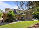 Backyard view of the home featuring a patio and mature landscaping at 71012 Russell, Chapel Hill, NC 27517