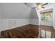 A bedroom featuring hardwood floors, natural light, and a ceiling fan at 71012 Russell, Chapel Hill, NC 27517